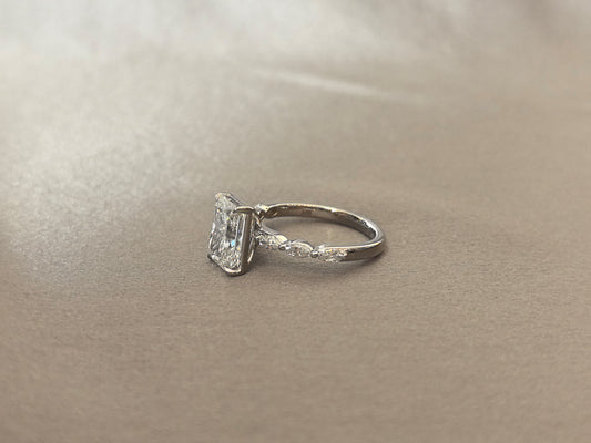 RD-008 | Radiant-Cut Diamond Engagement Ring | Marquise & Round Side Stones | Modern Solitaire Ring