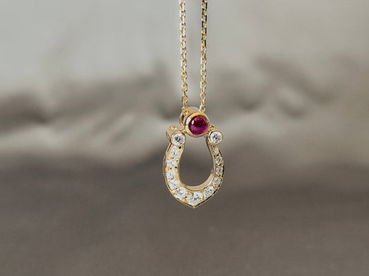 The Modern Equestrian | Ruby & Diamond Horseshoe Pendant