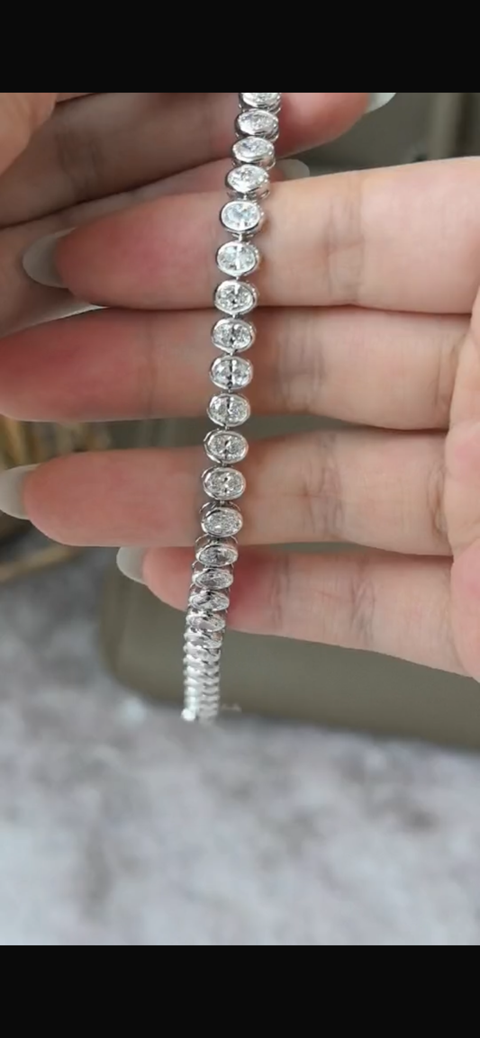 Juno Diamond stunning oval-shaped bezel-set tennis bracelet
