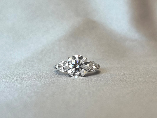 Round-Center Trilogy Ring with Pear Sidestones