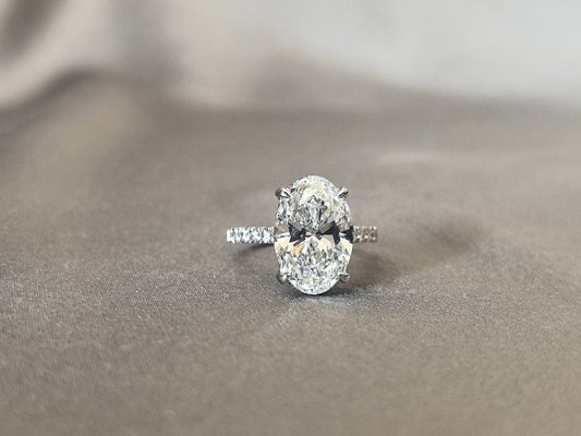 Dainty pink Hidden Halo Oval Lab Diamond Ring