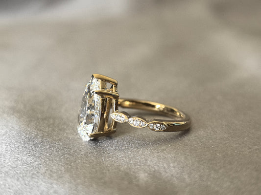 4 Carat Pear-Shaped Lab Diamond Ring | 14K Yellow Gold | Triple Marquise-Style Round Diamond Accents on Each Side | Symmetrical Cluster Design