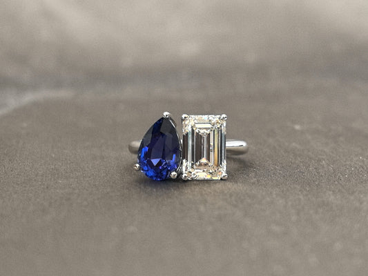 3 carat Emerald Diamond with 3 carat Pear-Shaped Sapphire ring