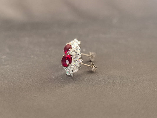 GE-003 | Oval Pigeon Blood Ruby Earrings | Pear & Marquise Diamond Accents | Four Prong Setting | Unique Design