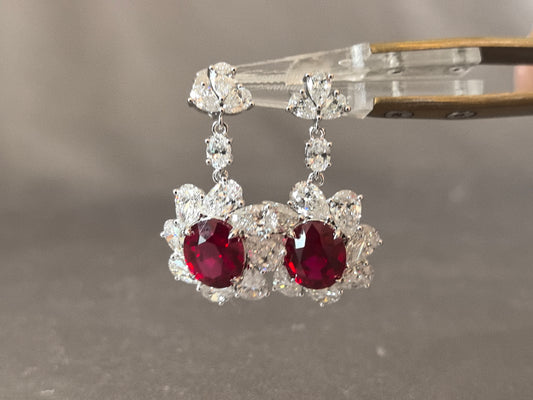 GE-004 | Oval Pigeon Blood Ruby Drop Earrings | Pear & Oval Diamond Accents | Four Prong Setting | Unique Design