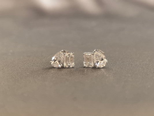 Juno Diamond E-004|Pear & emerald-cut lab diamond stud earrings|Secure prong-set|Dual-cut sparkle contrast|Modern asymmetric diamond earrings