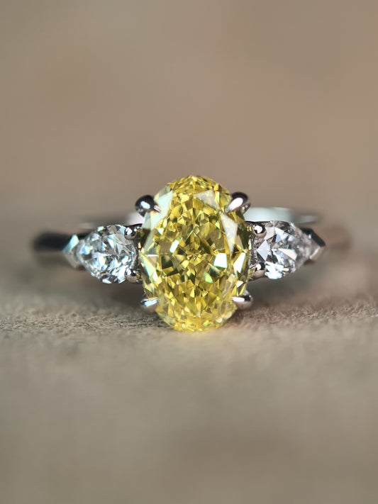 Juno Diamond Fancy Vivid Yellow Oval Pear Three-Stone Ring