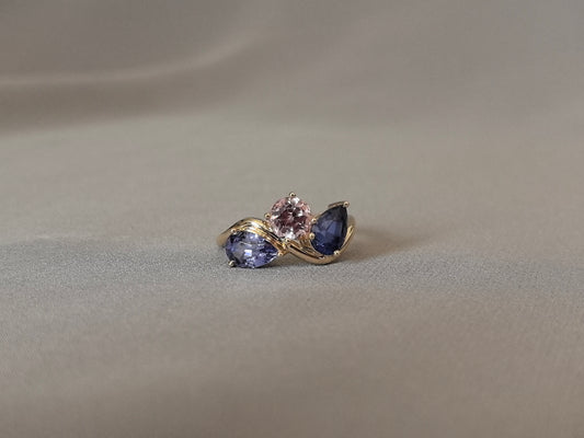GR-005 | Three-Stone Ring | Pear Shape Blue Birthstone | Round Pink Diamond | Curved Shank