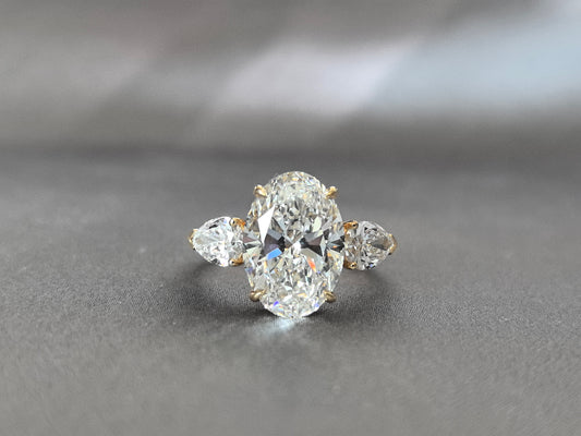 Oval Center Trilogy Ring | Pear Sidestones | Fluid Elegance | Lab-Grown Diamonds