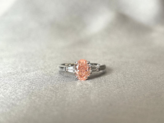 1.3ct 3.2g Oval Pink Lab Diamond Three-Stone Ring | Baguette & Triangle Side Stones