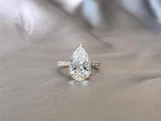 Pear-Shaped Minimalist Pavé Ring | Half Eternity Design | Elegant Teardrop Silhouette | Lab-Grown DiamondsPear-Shaped Minimalist Pavé Ring | Half Eternity Design | Elegant Teardrop Silhouette | Lab-Grown Diamonds