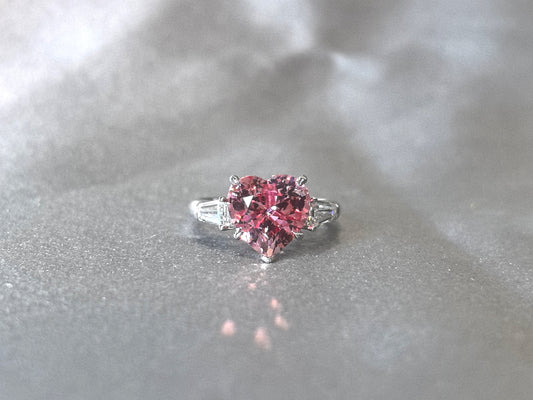 5.4ct 5.6g Heart Cut Padparadscha Sapphire Three-Stone Ring | Baguette Side Stones