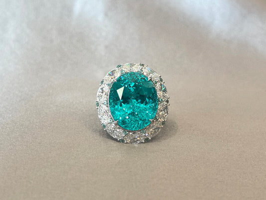 29.33ct 17.6g Paraiba Ring: Oval Diamond Frame with Mini Round Paraiba Accents