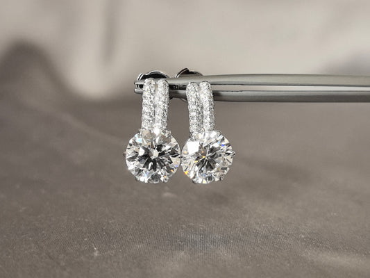 A pair of round lab-created diamond stud earrings | Two vertical rows of small diamonds | Elegant design