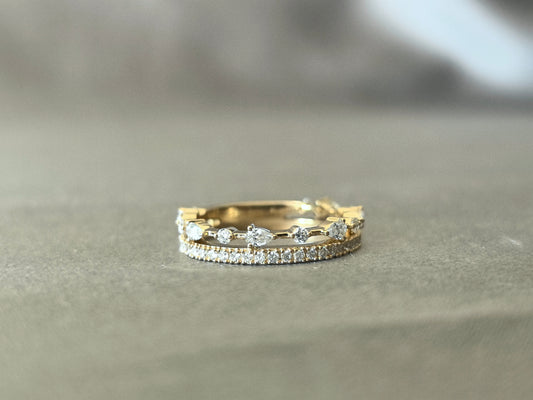 Double-layer ring | Top layer set with marquise and round diamonds | Bottom layer encircling a row of small round diamonds | Vintage design | Lab-created diamonds