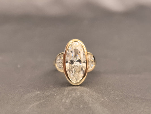 OV-006| Moval Three Stone Diamond Ring | Half Moon Side Stone | Bezel Setting