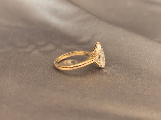 PE-020 | Minimalist Pear-Cut Solitaire Ring | Polished High-Shine Smooth Band | Durable, Comfort-Fit Construction