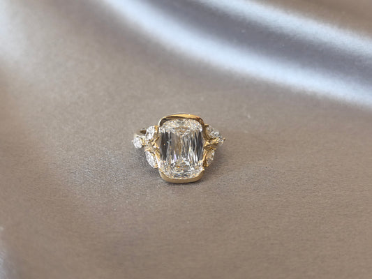 EM-007 | Emerald-Cut Diamond Engagement Ring | Leaf Accents | Partial Bezel-Set | Nature-Inspired Aesthetic