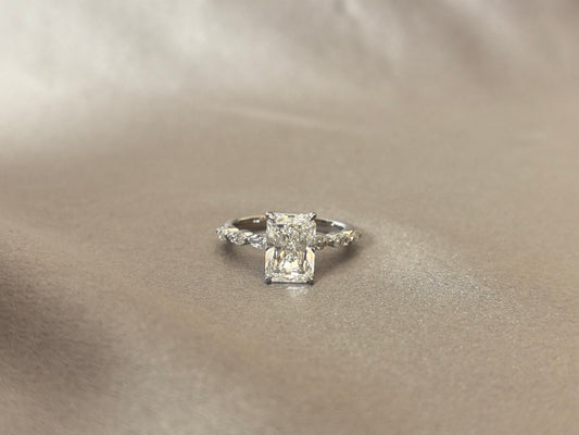 RD-008 | Radiant-Cut Diamond Engagement Ring | Marquise & Round Side Stones | Modern Solitaire Ring