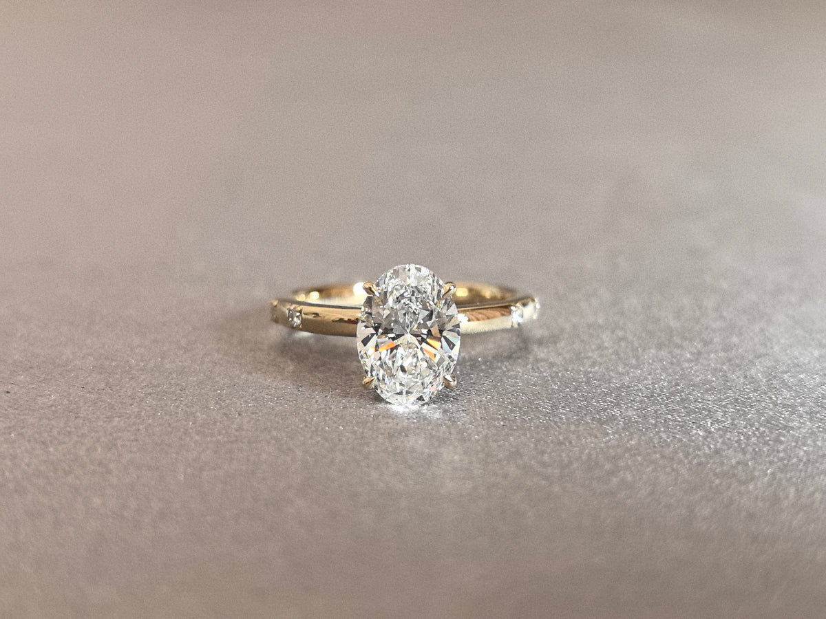 Juno Diamond OV-085 | 2 Carat Oval-Cut Lab-Grown Diamond Ring with Spaced Diamond-Cluster Accents Ring