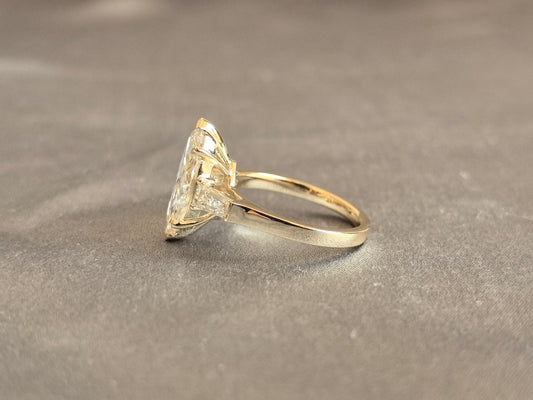 Juno Diamond MX-035 | 4 Carat Yellow Pear-Cut Lab-Grown Diamond Three Stone Ring with Symmetrical Tapered Baguette Arrangement in Yellow Gold Ring
