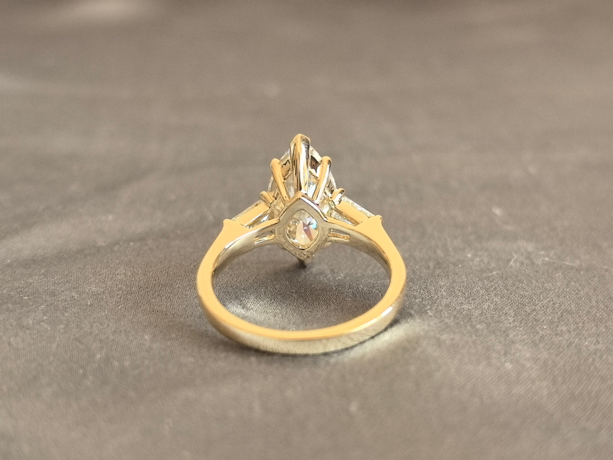 Juno Diamond MX-035 | 4 Carat Yellow Pear-Cut Lab-Grown Diamond Three Stone Ring with Symmetrical Tapered Baguette Arrangement in Yellow Gold Ring