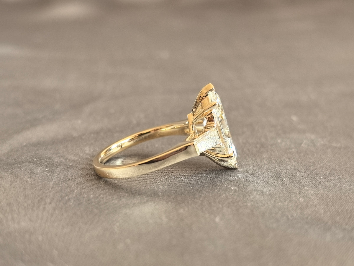 Juno Diamond MX-035 | 4 Carat Yellow Pear-Cut Lab-Grown Diamond Three Stone Ring with Symmetrical Tapered Baguette Arrangement in Yellow Gold Ring