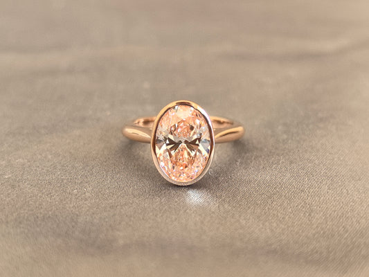 Juno Diamond OV-092 | 3 Carat Baby Pink Oval Lab-Grown Diamond Ring with Sculptural Bezel Setting in Yellow Gold Ring