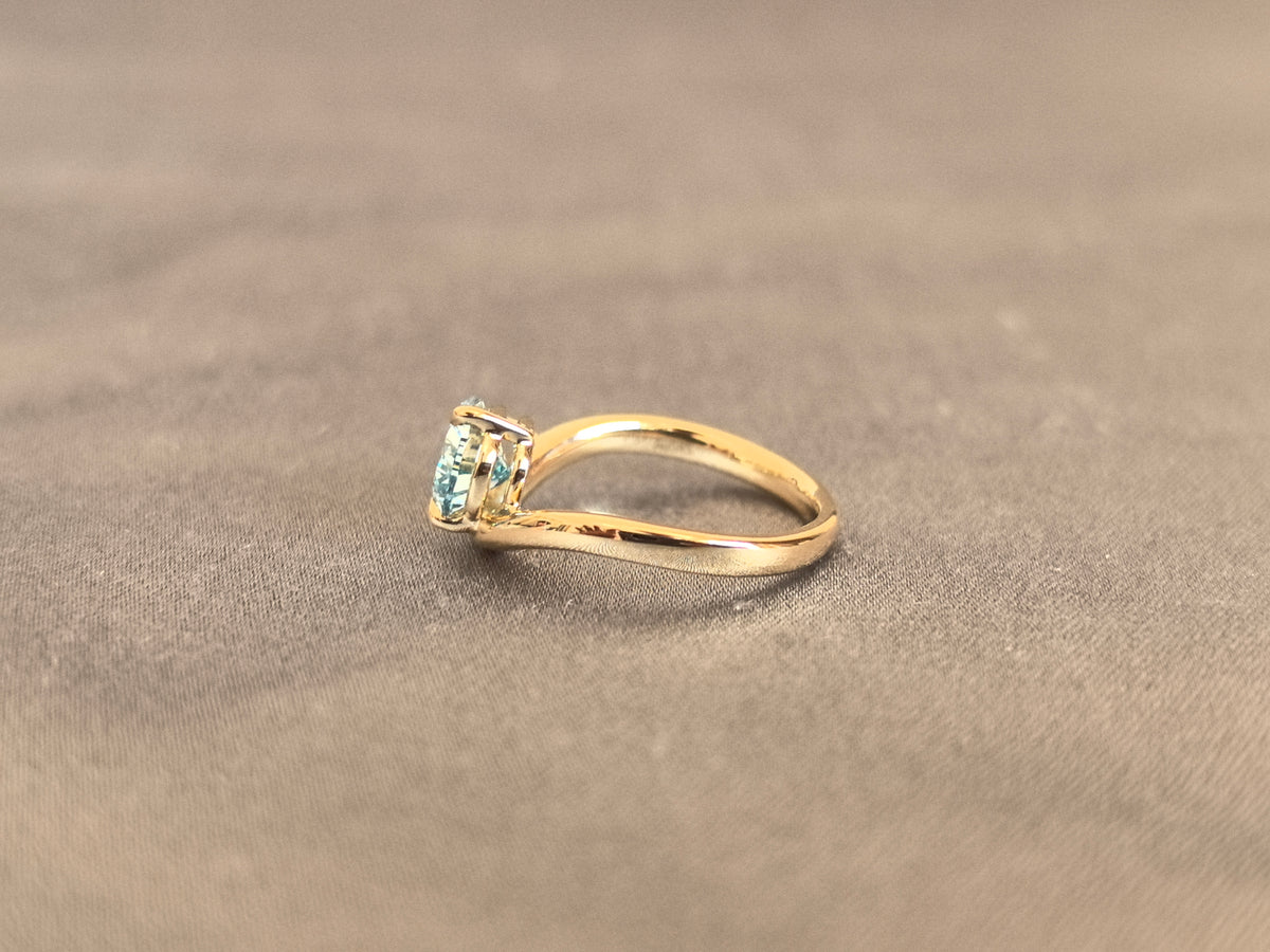 Juno Diamond PE-055 | 1 Carat Blue Pear-Cut Lab-Grown Diamond Ring Featuring Sculptural Curved Band in Yellow Gold Ring