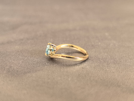 Juno Diamond PE-055 | 1 Carat Blue Pear-Cut Lab-Grown Diamond Ring Featuring Sculptural Curved Band in Yellow Gold Ring