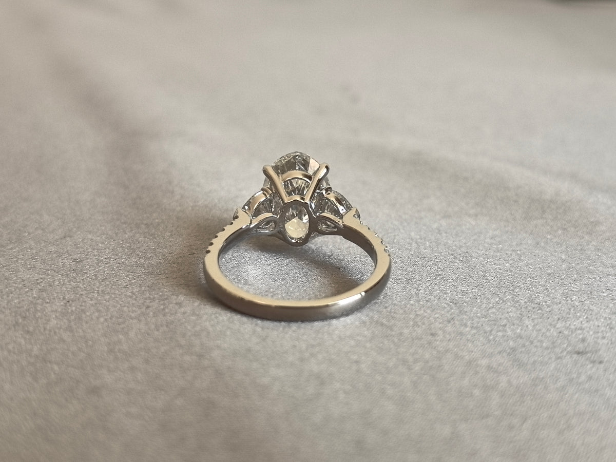 Juno Diamond OV-095 | 5 Carat Oval Center Lab-Grown Diamond Three Stone Ring with Tapered Pave Diamond Band Ring