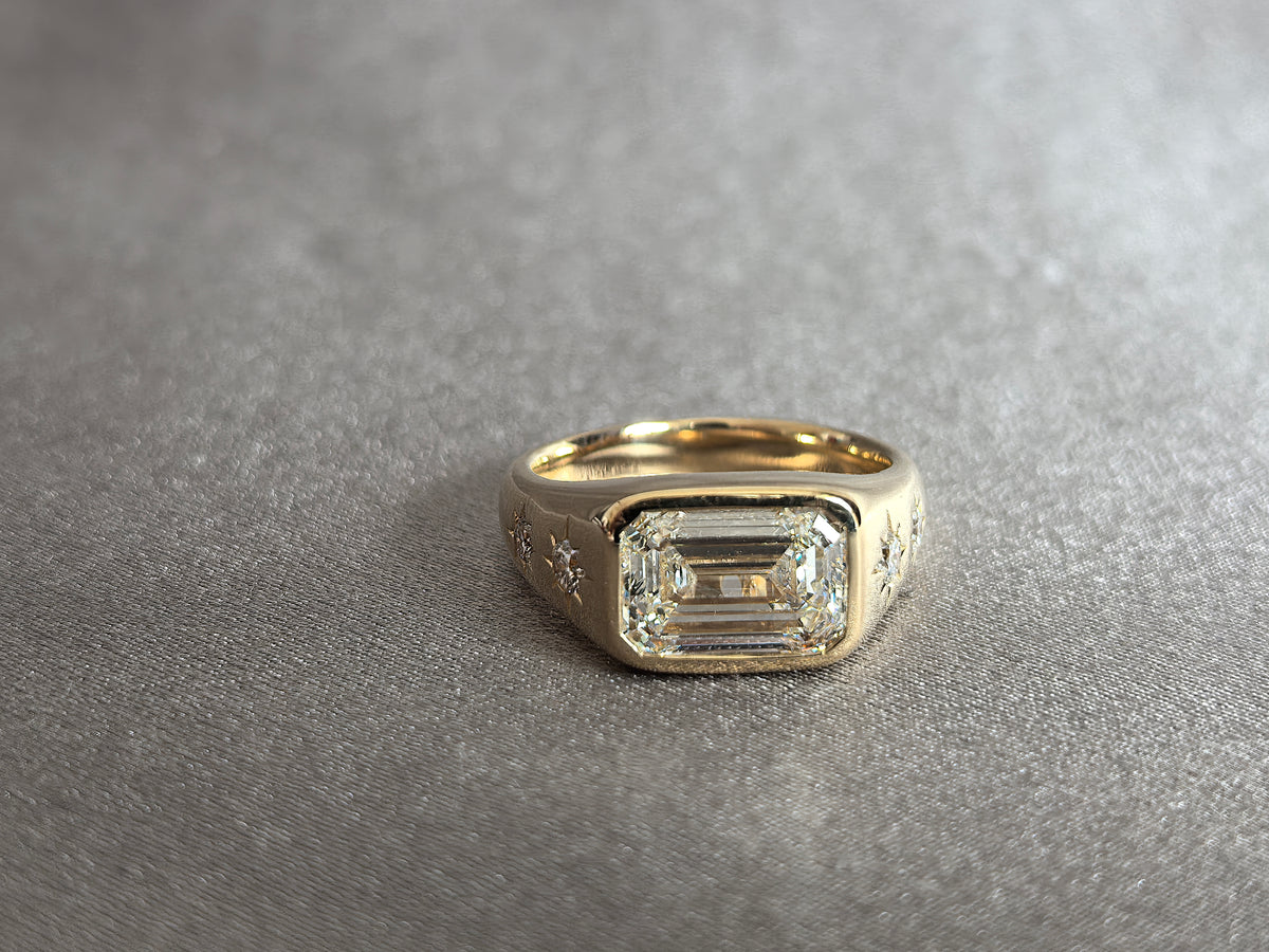 Juno Diamond EM-017 | 2 Carat Emerald-Cut Lab-Grown Diamond Full-Bezel Ring with Star-Set Round Accents