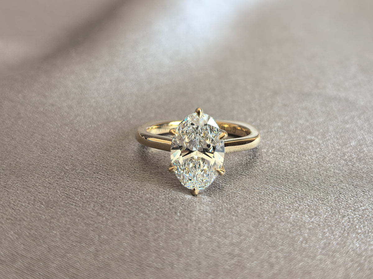 Juno Diamond PE-033 | 2 Carat Pear-Cut Lab-Grown Diamond Solitaire Ring With Marquise Accent And Pavé Band