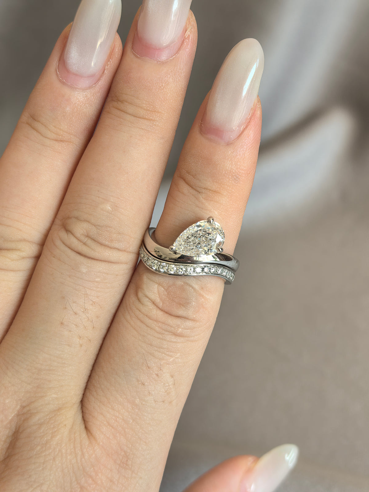 Juno Diamond PE-035 | Pear-Shaped Lab-Grown Diamond Ring With Curved Pavé Band