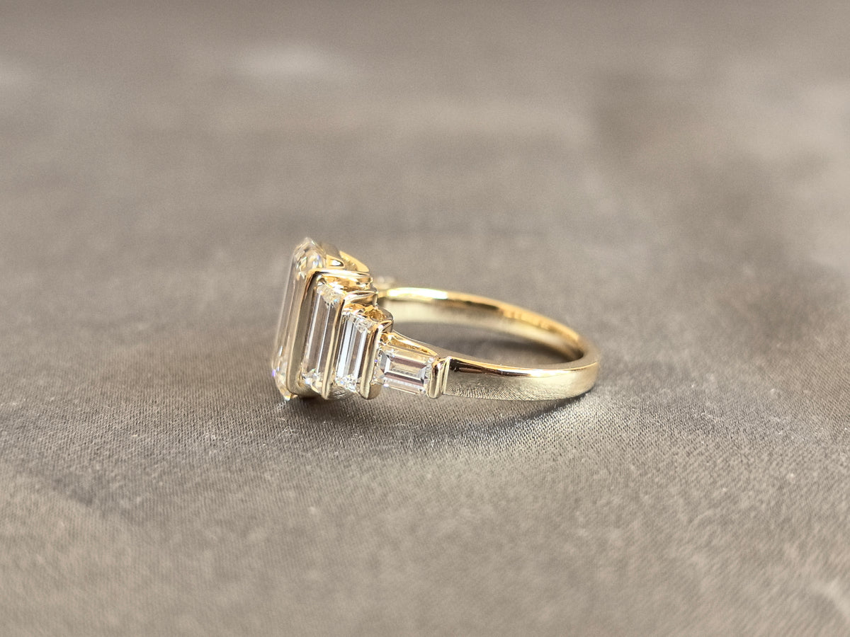 Juno Diamond EM-031 | Emerald-Cut Lab-Grown Diamond Ring With Vertical Tiered Baguette Halo In Yellow Gold