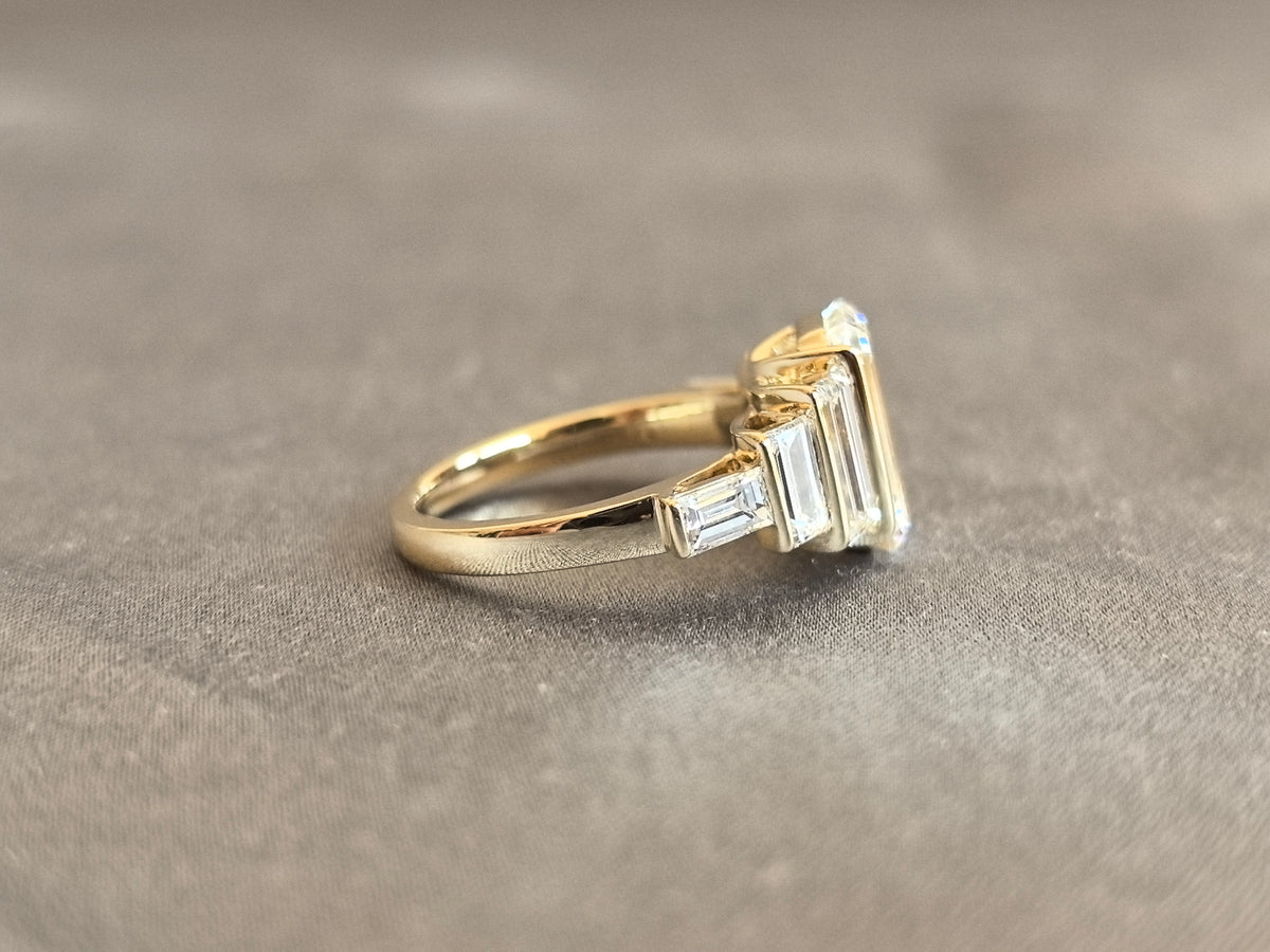 Juno Diamond EM-031 | Emerald-Cut Lab-Grown Diamond Ring With Vertical Tiered Baguette Halo In Yellow Gold