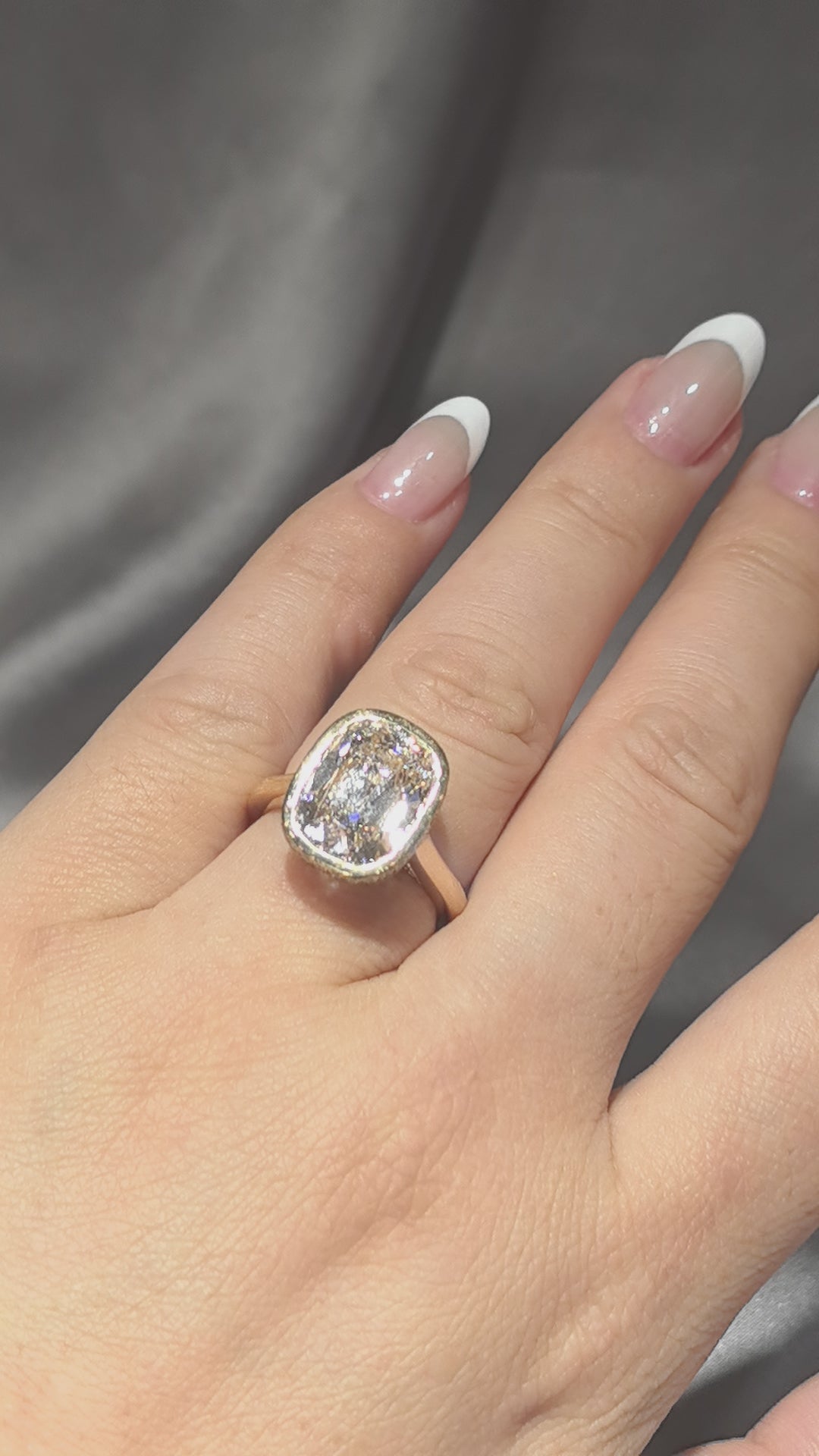 7-carat old mine cut elongated cushion bezel setting In 14K yellow gold
