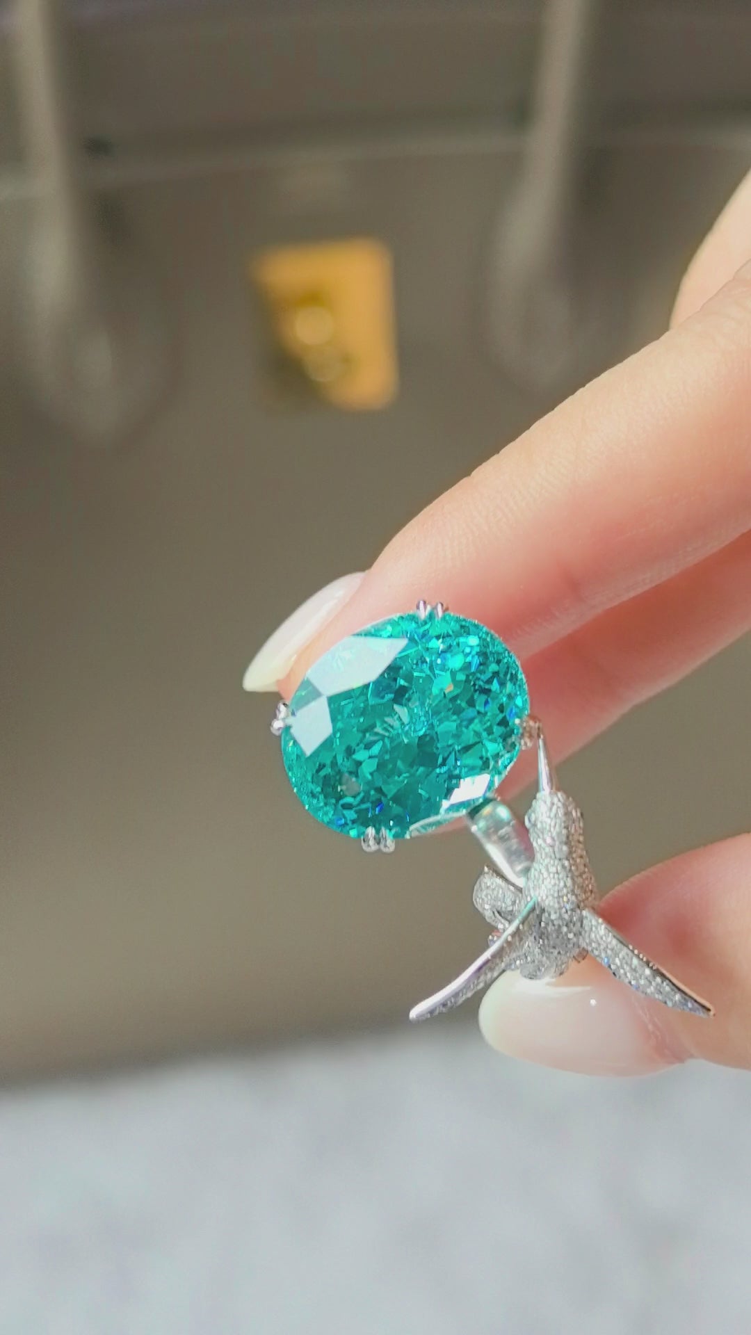 13.7ct 13.5g Oval Paraiba Ring with Flying Bird Setting | Open Band Design