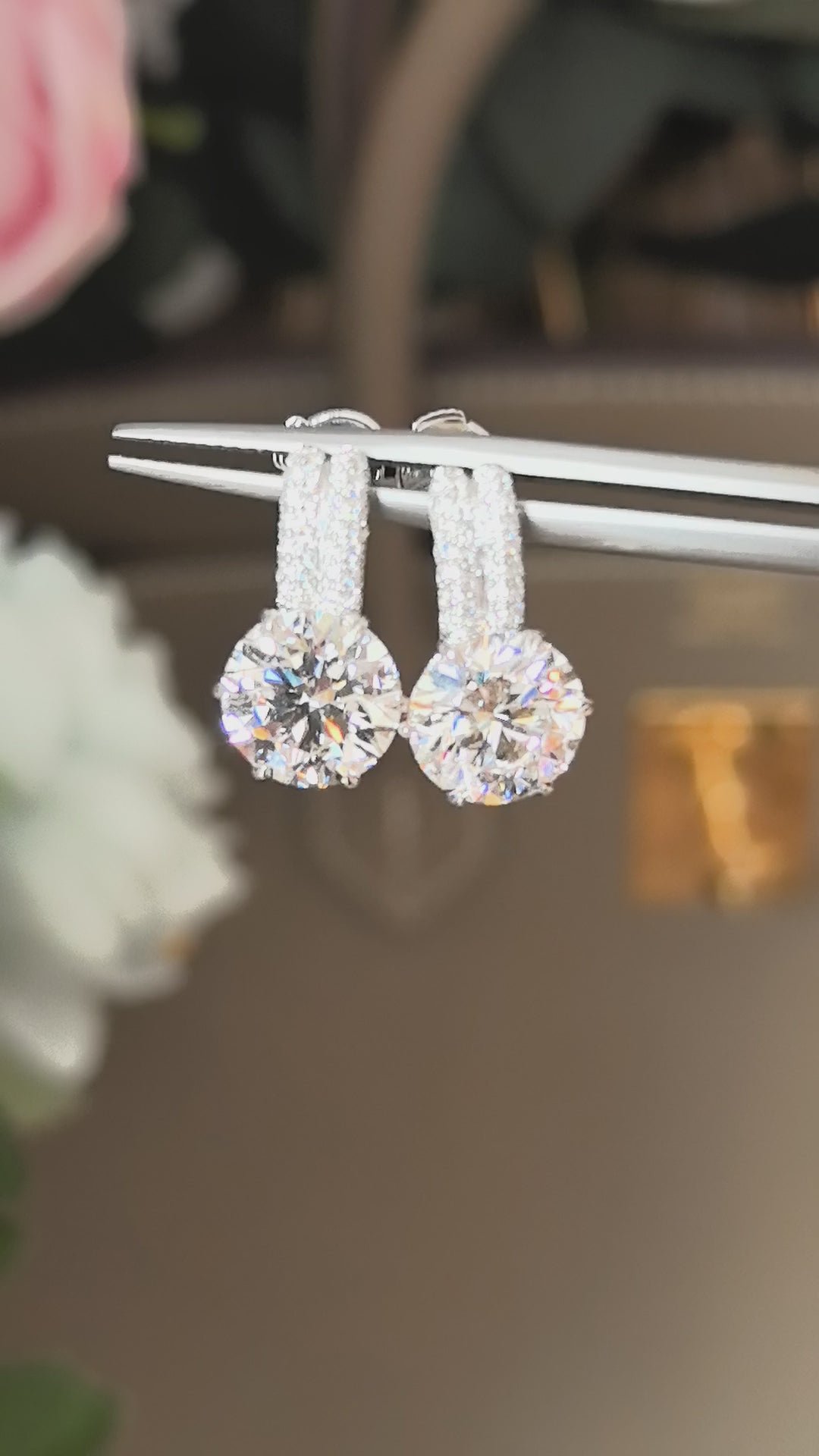 A pair of round lab-created diamond stud earrings | Two vertical rows of small diamonds | Elegant design