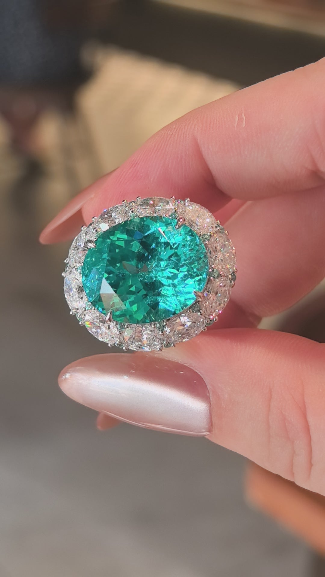 29.33ct 17.6g Paraiba Ring: Oval Diamond Frame with Mini Round Paraiba Accents