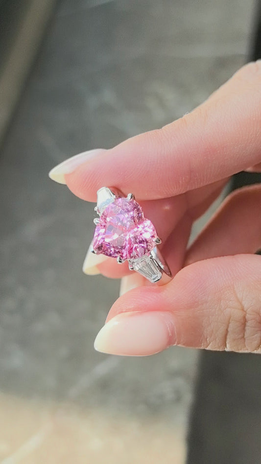 5.4ct 5.6g Heart Cut Padparadscha Sapphire Three-Stone Ring | Baguette Side Stones