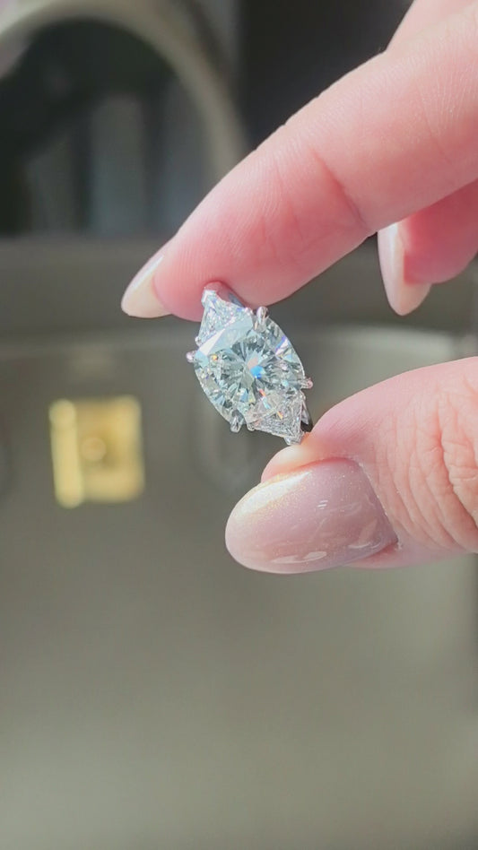 Cushion-Center Trilogy Ring with Trillion-Cut Sidestones