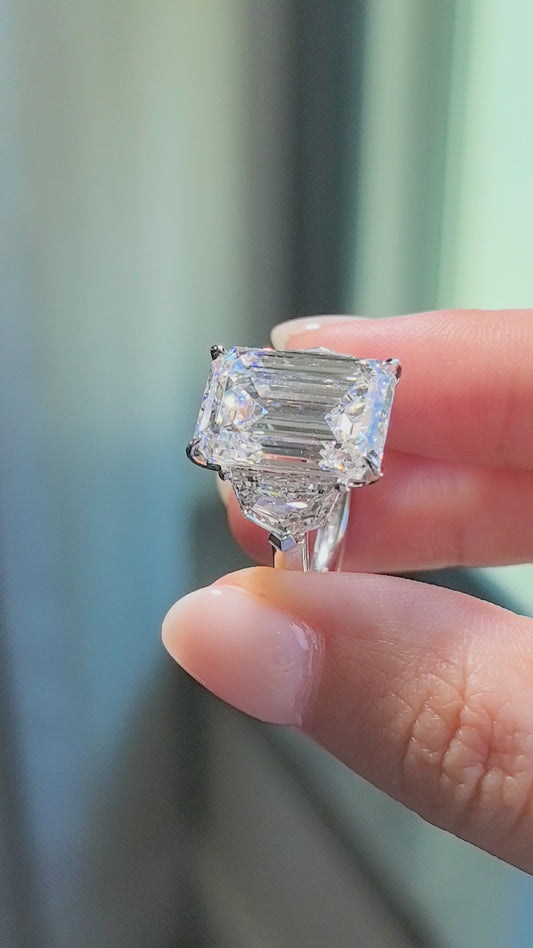 Emerald-Center Trilogy Ring with Cadillac Sidestones