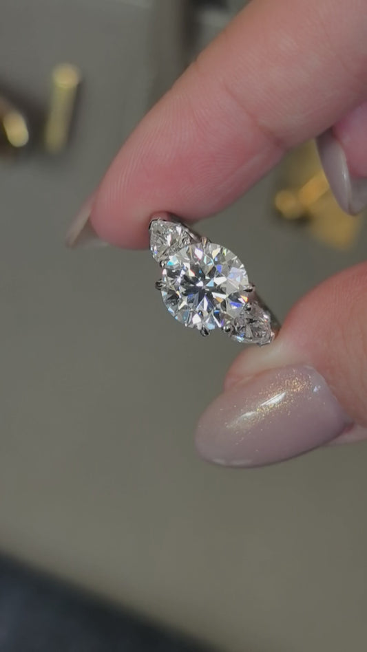 Round-Center Trilogy Ring with Pear Sidestones